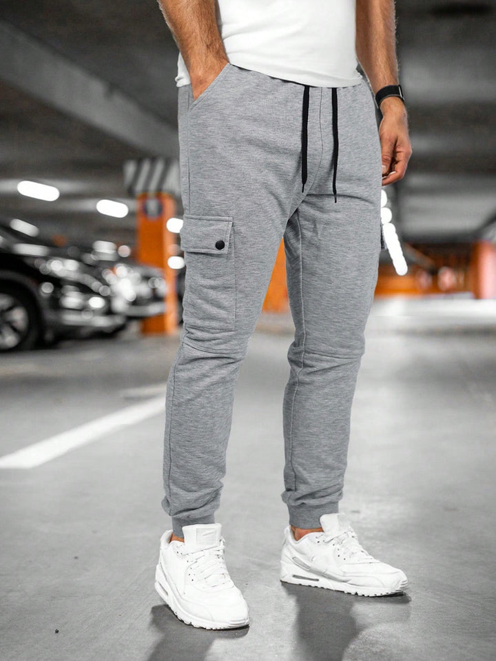 Tom | Heren joggingbroek met draai-omslag zak · Oliver Bradley