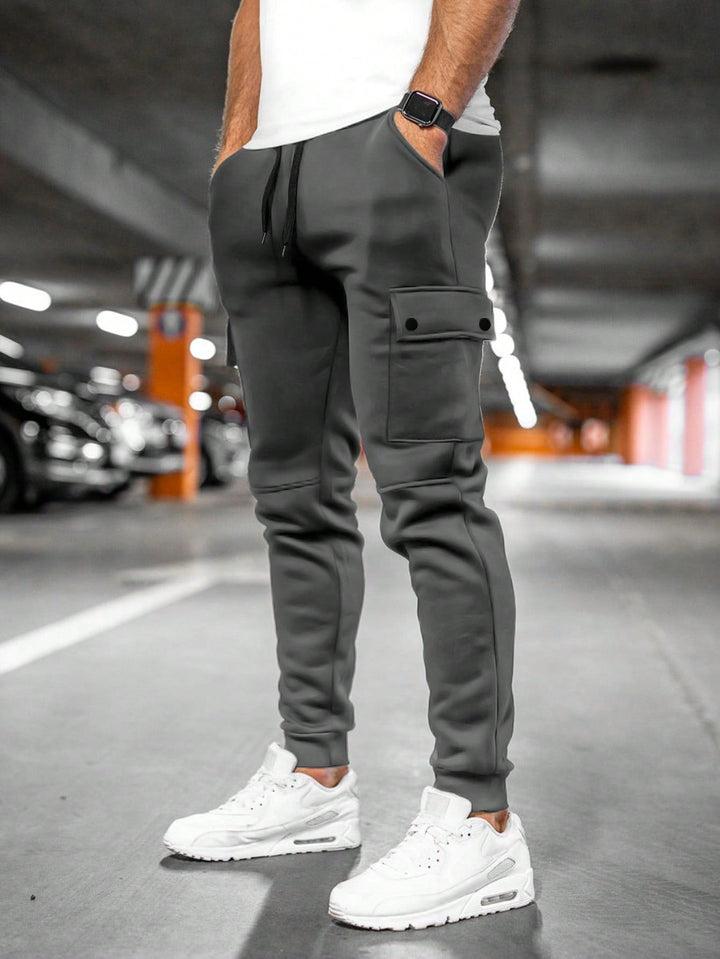 Tom | Heren joggingbroek met draai-omslag zak · Oliver Bradley